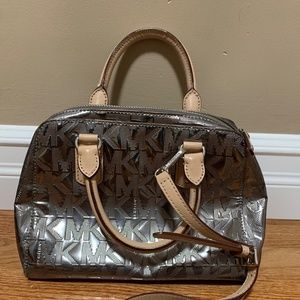 Michael Kors gun metal purse with crossbody straps